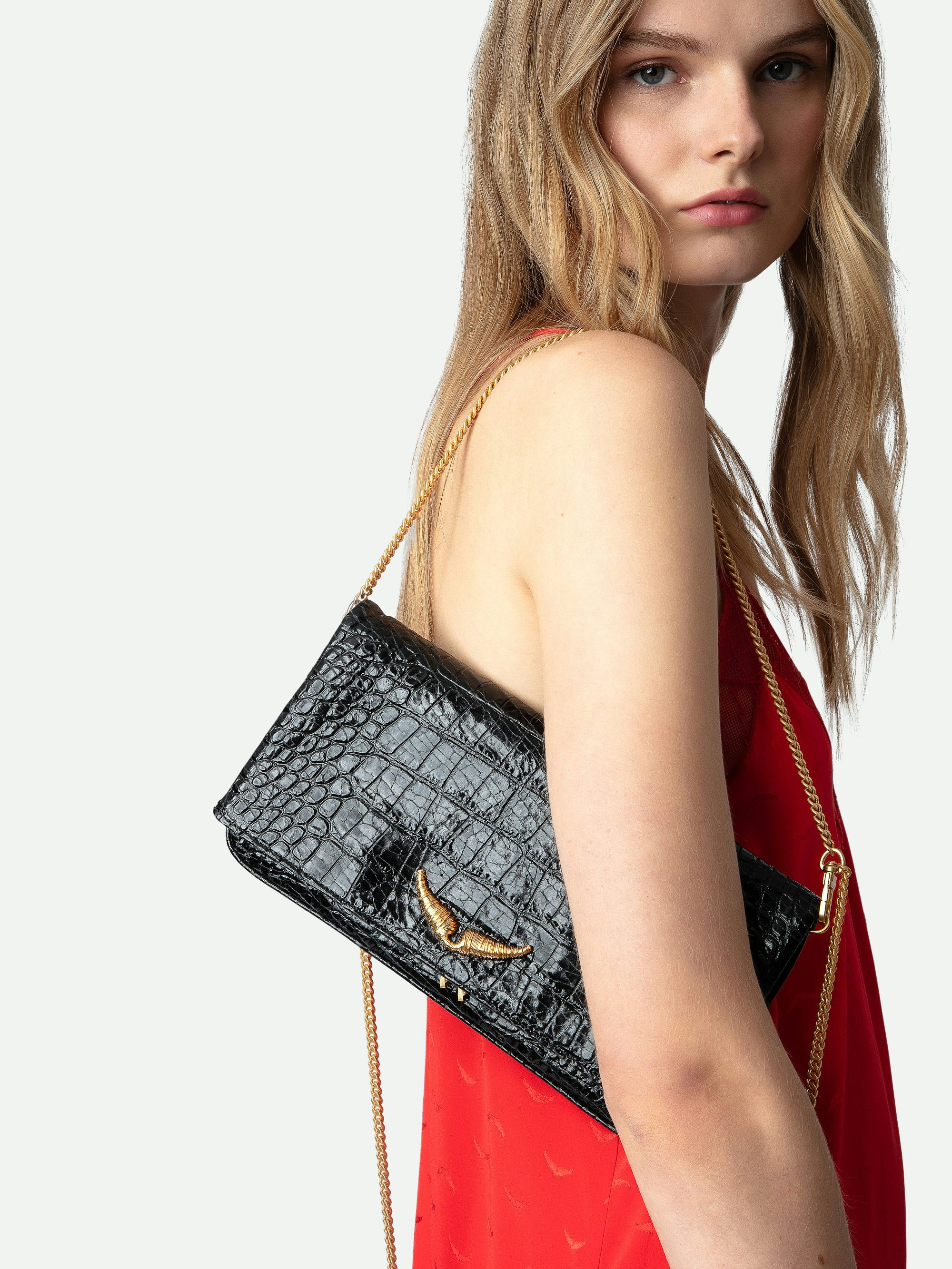 Rock Goossens Embossed Clutch - Zadig&Voltaire has called upon the expertise of the art house GOOSSENS to highlight its emblematic wings on its iconic bag: the ROCK clutch.